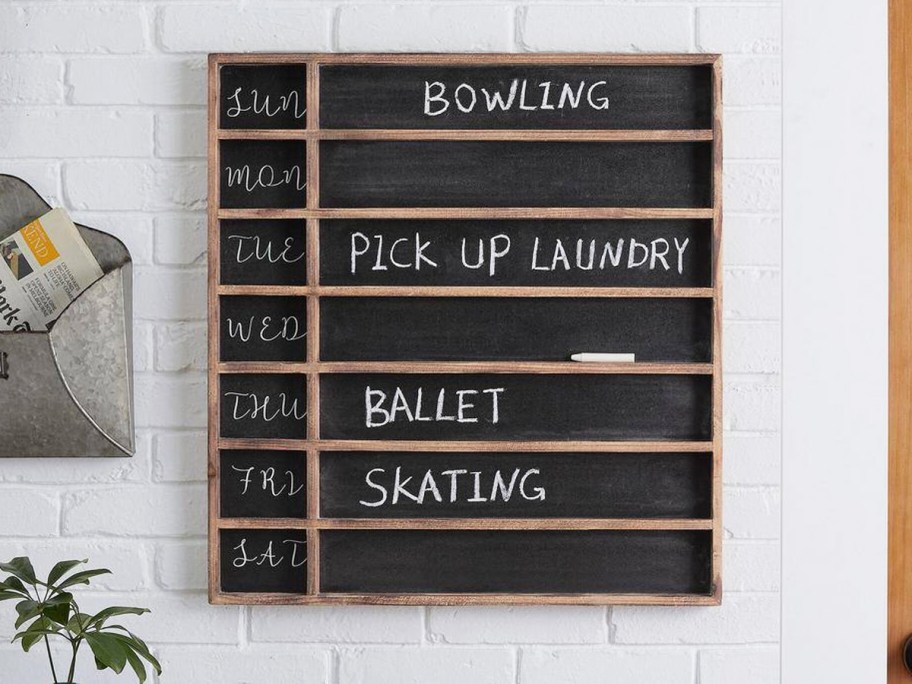 7-day chalkboard on wall