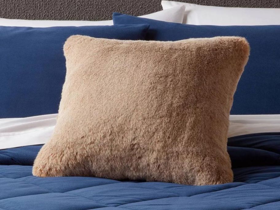 Threshold Square Luxe Faux Fur Throw Pillow on bed