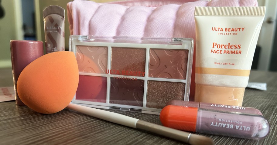 ulta brand cosmetics in front of a pink makeup bag