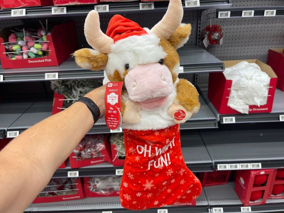 Cow in a red stocking displayed in a store