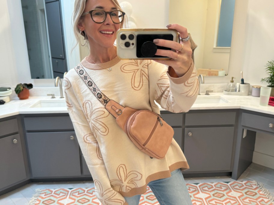 Woman wearing flower sweater in beige and brown in her bathroom-2