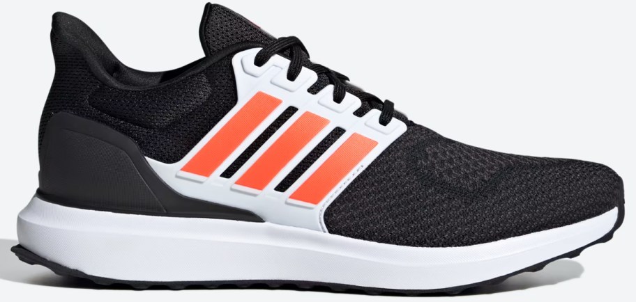 black, white, and orange adidas running shoe