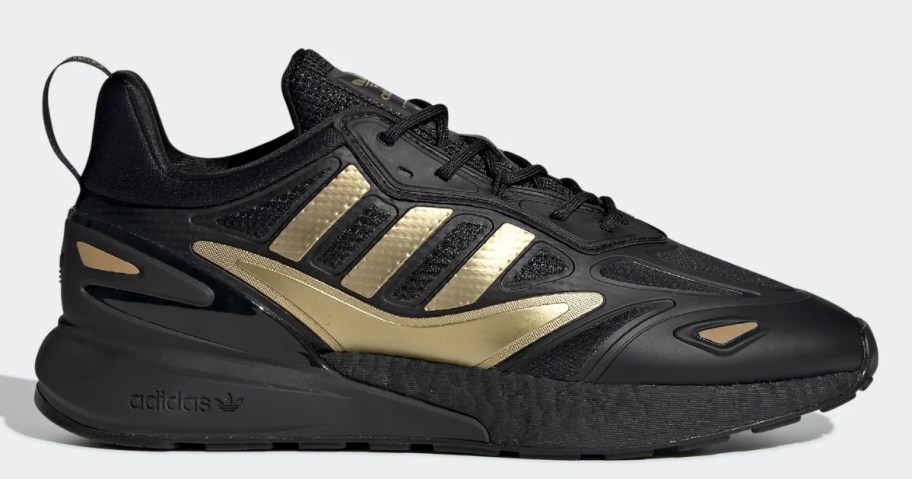 black and gold men's adidas sneaker