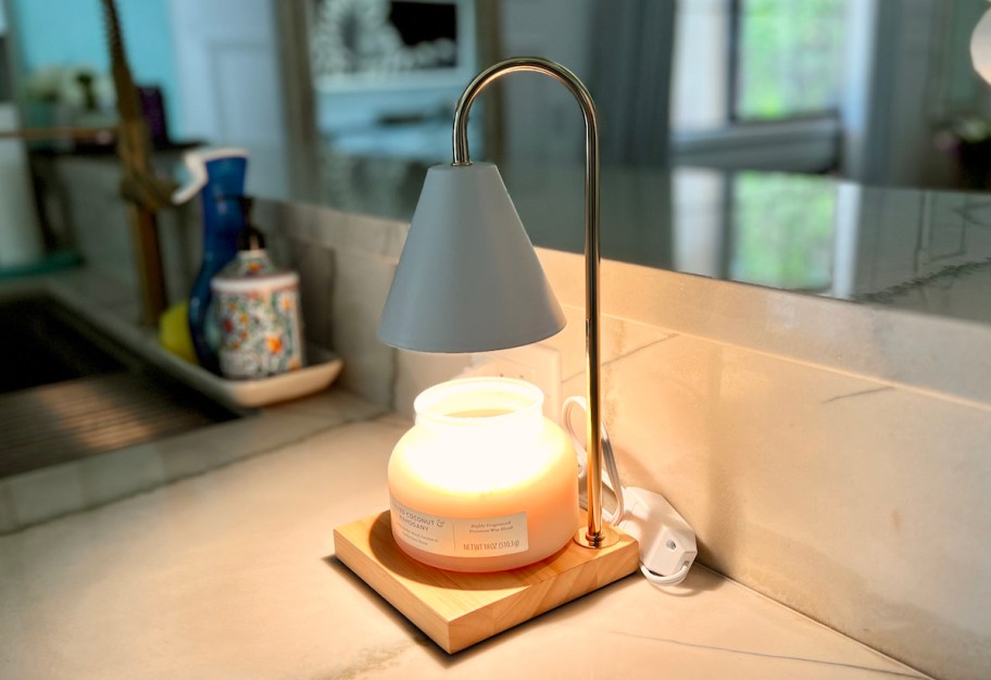 white candle warmer lamp on kitchen counter