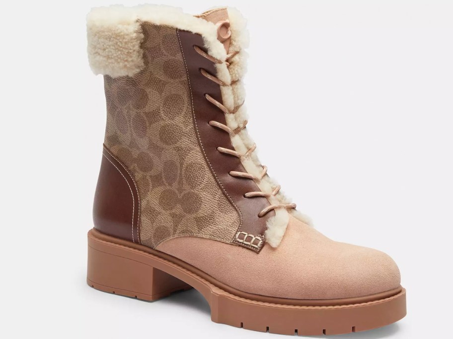 coach brown boots with fur stock image 