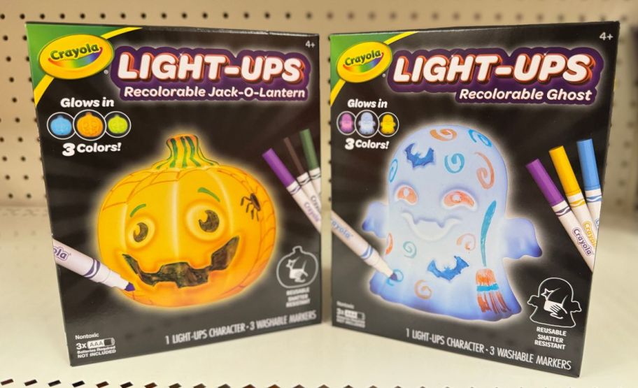 two crayola light-ups in orange jack o'lantern and blue ghost