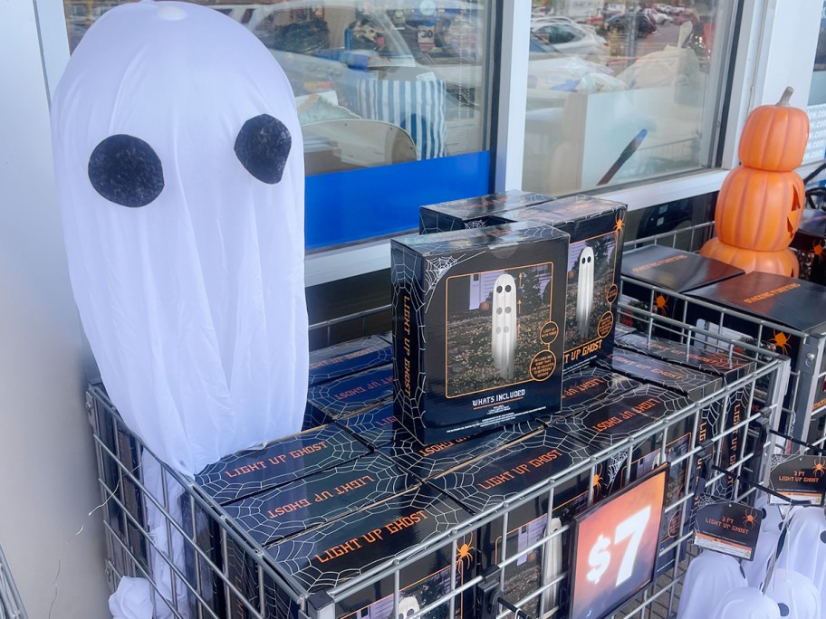 light up ghost decor on top of boxes 