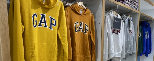 gap hoodies hanging in store