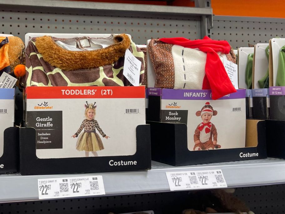 Way To Celebrate Gentle Giraffe and sock monkey Toddler Halloween Costumes on shelf in store
