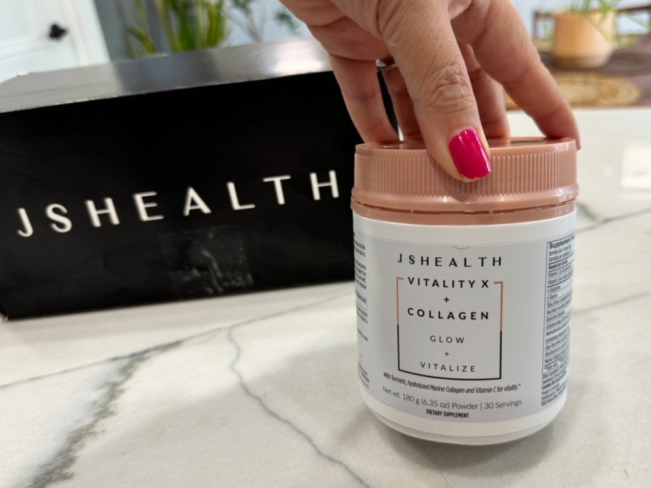 hand holding JShealth collagen