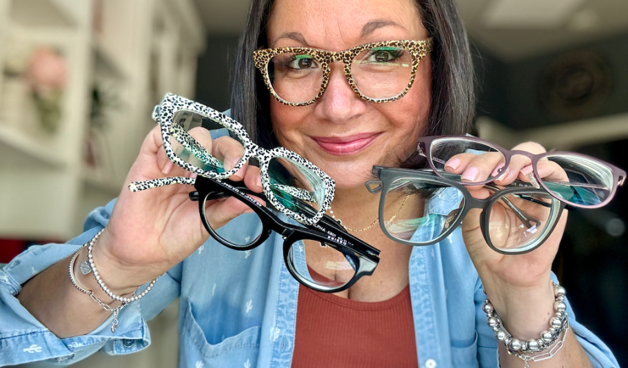 woman holding Kits eyeglasses 