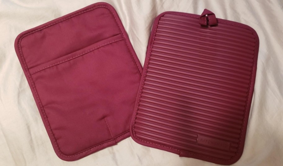 two red rectangular oven mitts
