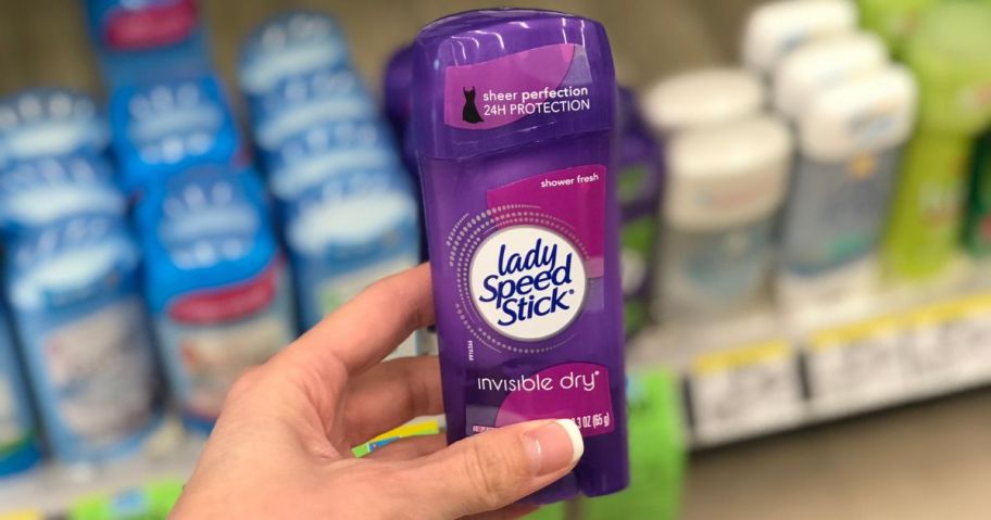 hand holding lady speed stick in store