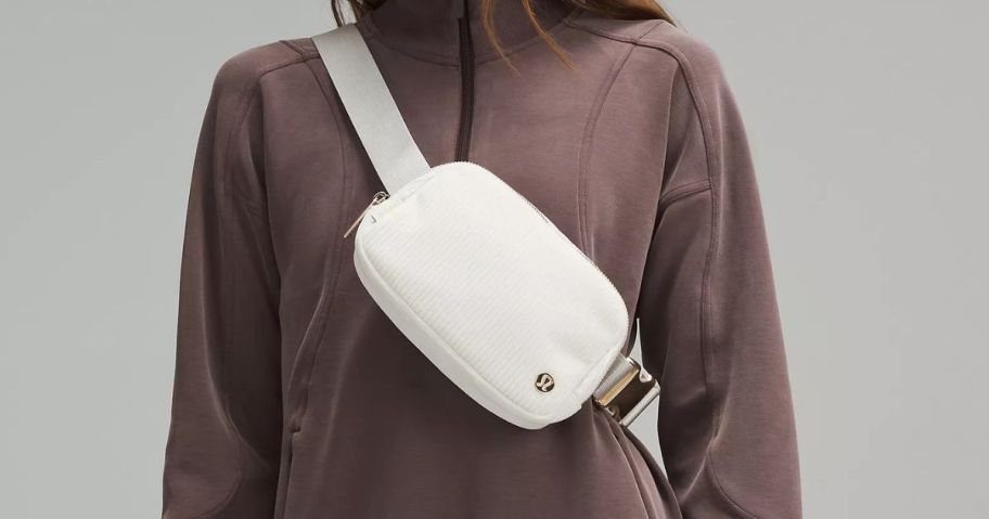 a woman wearing a lululemon Everywhere Belt Bag 1L Corduroy