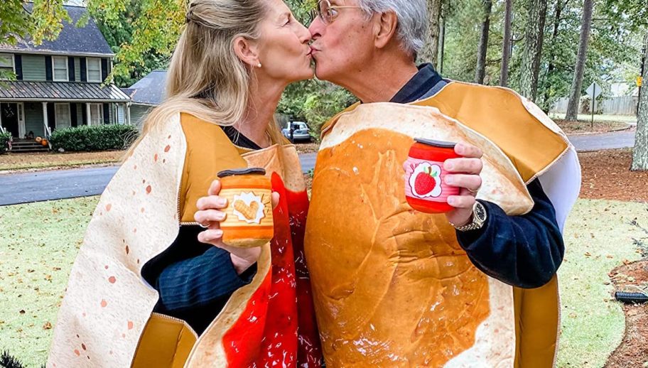 couple kissing wearing peanut butter and jelly halloween costume outside