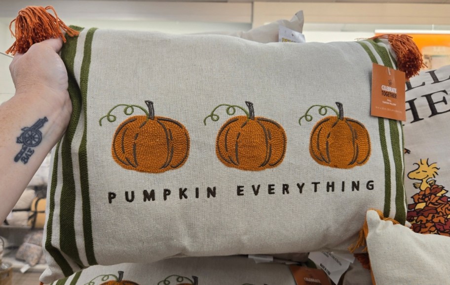 a lumbar throw pillow with the words pumpkin everything on the front with a 3 pumpkin graphic