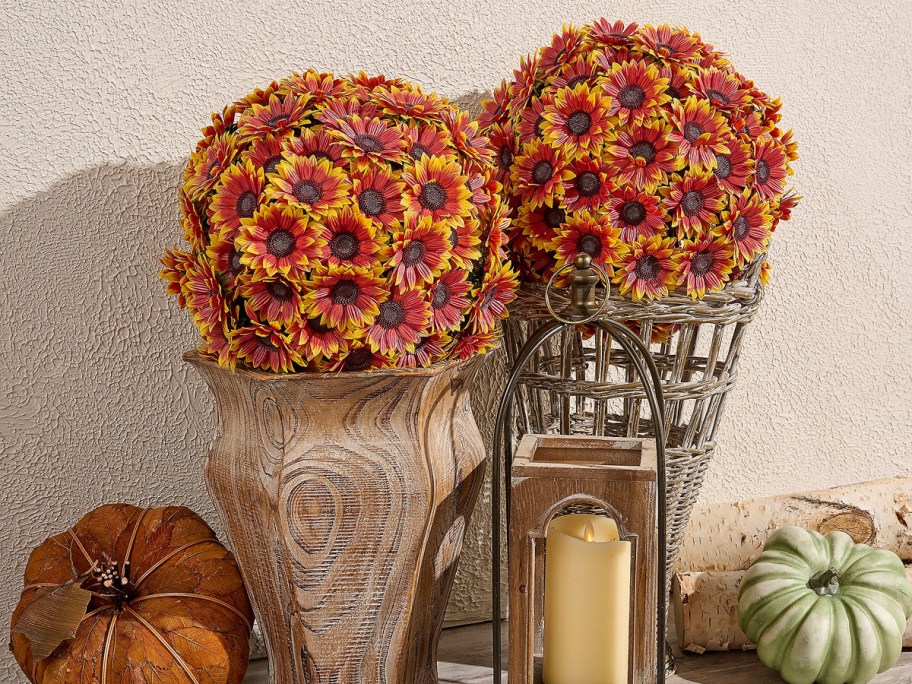 faux sunflower mum spheres in planters