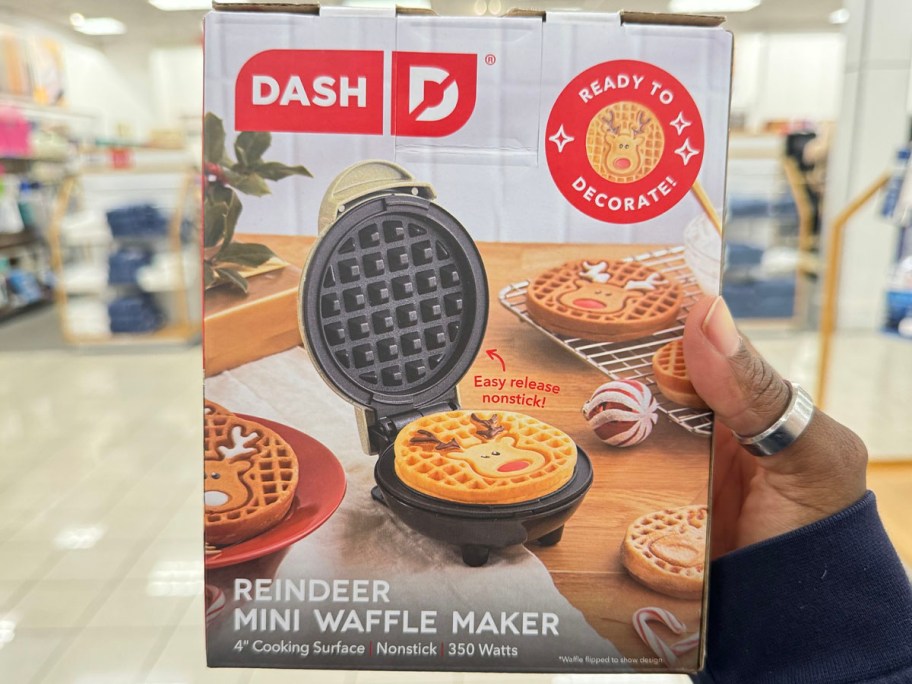 Hand holding reindeer waffle mini maker 