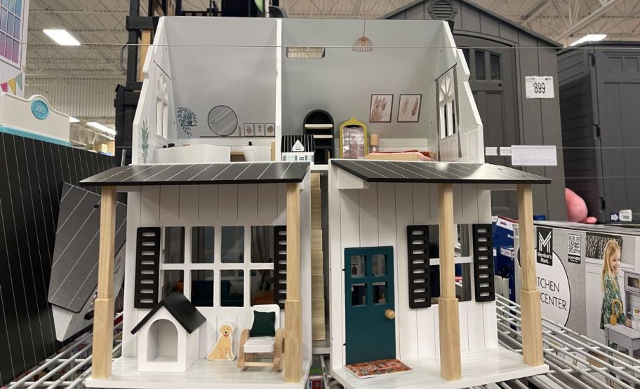 sams club farmstyle dollhouse on a store shelf