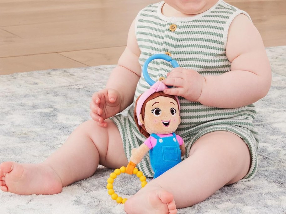 toddler playing with mrs rachel doll