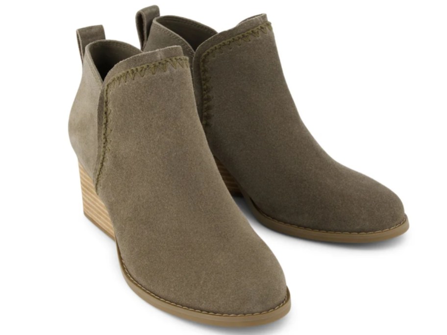 a pair of olive green women's ankle wedge boots