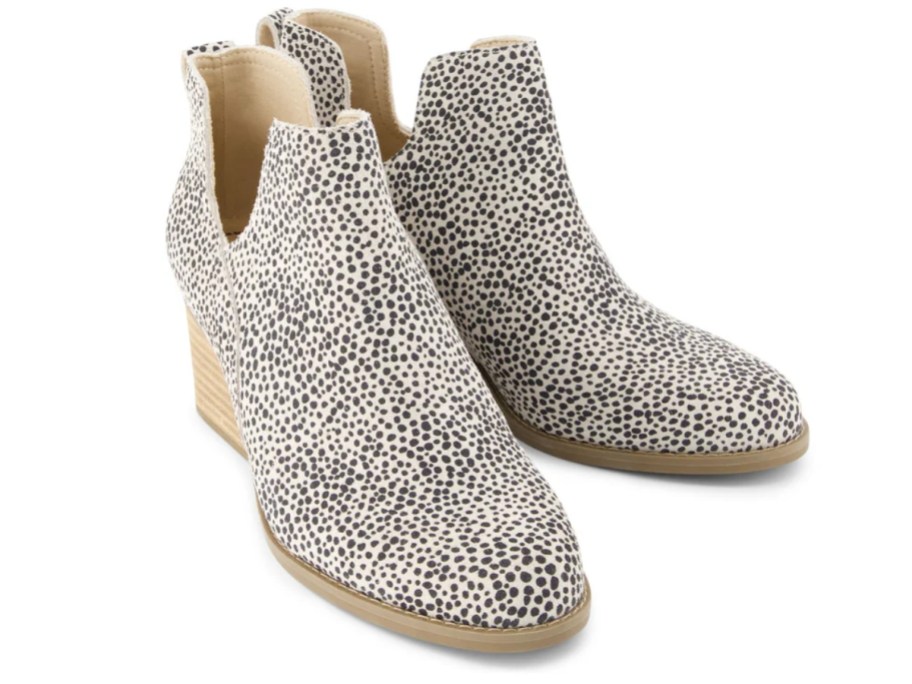 a pair of women's animal print ankle wedge boots
