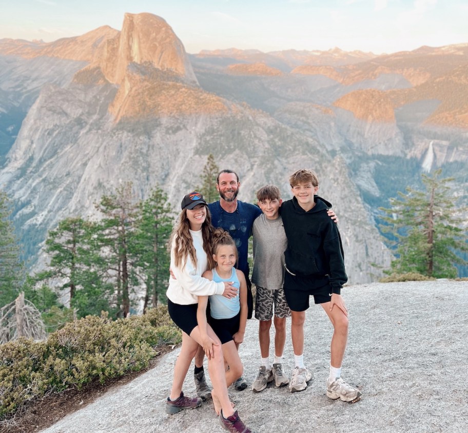 family standing outside at yosemite national park