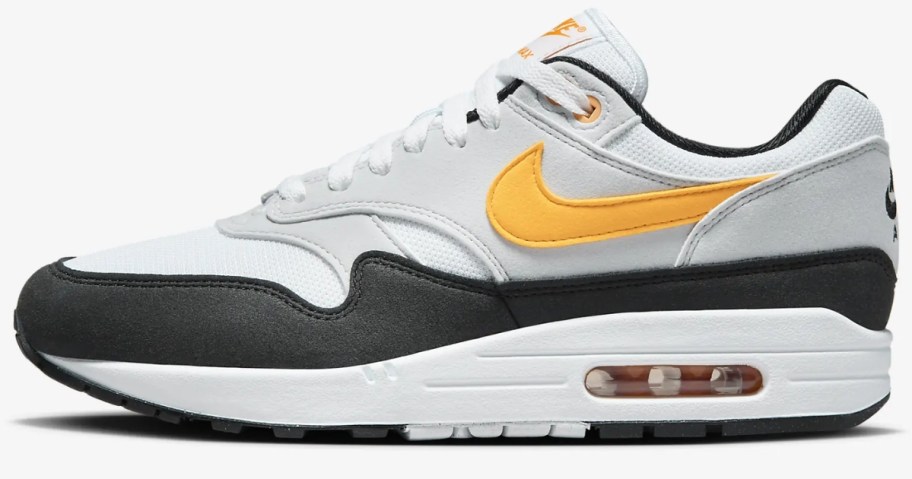 men's Nike Air Max shoe in white with black, grey, and yellow accents