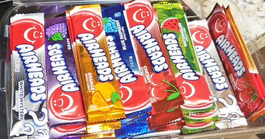 assorted airheads candy bars in a container