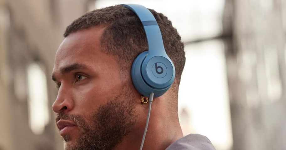 man wearing Beats Solo 4 Headphones