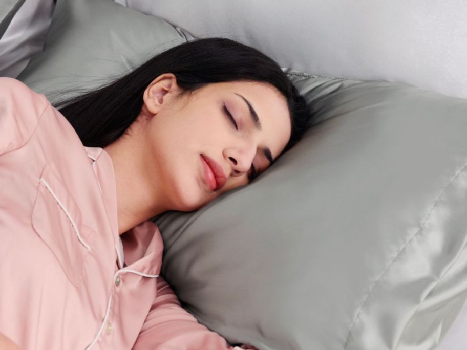 woman laying on a Bedsure Satin Pillowcase