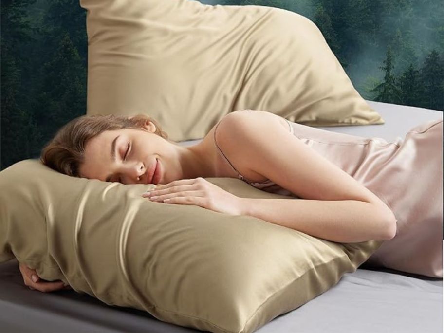 Woman laying on a Bedsure Silk Modal Pillowcase 