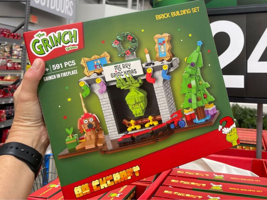 Brickcraft Grinch in Fireplace Brick Building Kit in hand in store