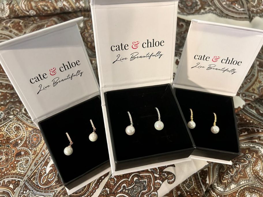 3 open Gift Boxes with Cate & Chloe Daphne earrings inside