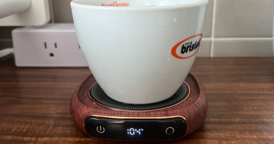 A coffee mug on a Lerat Coffee Mug Warmer