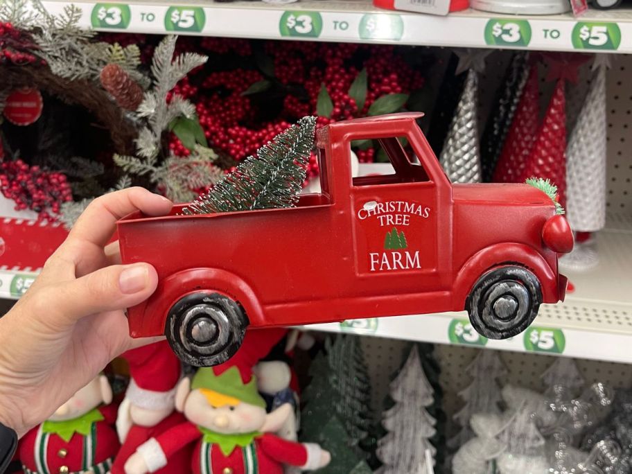 Red Vintage farm Truck Decoration with a christmas tree in the back