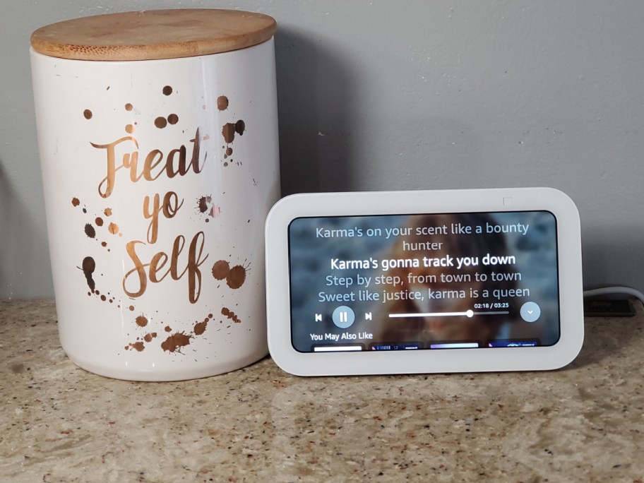 Echo Show 5 displayed next to snack bin on table