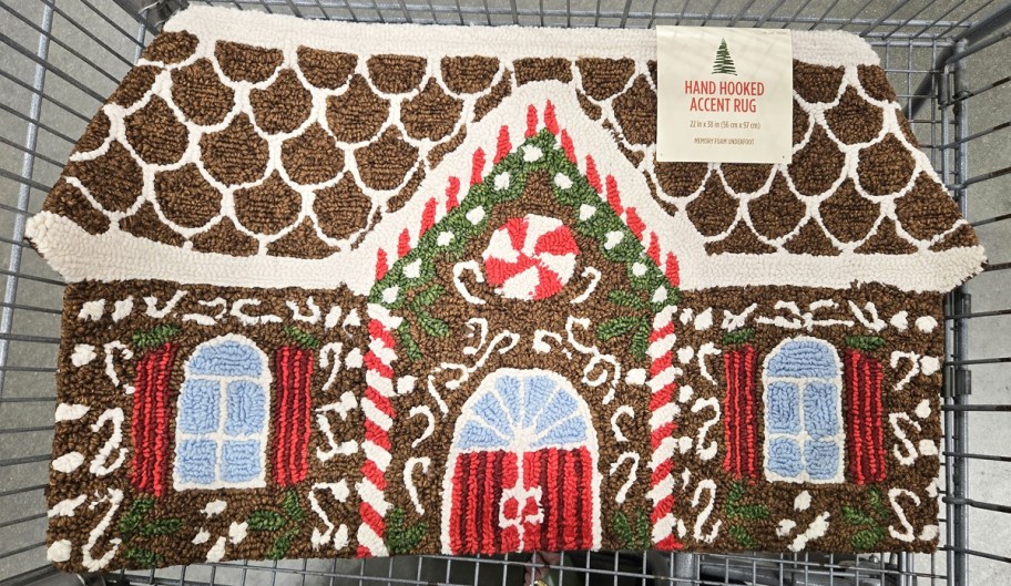 gingerbread house christmas rug in a shopping cart