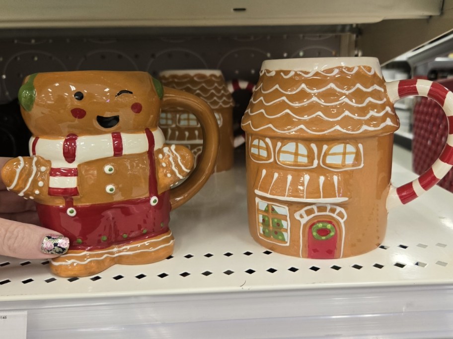 target gingerbread man and house mugs on store shelf