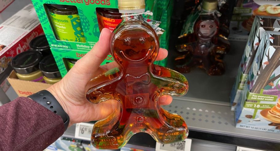 hand holding Great Value Pure Maple Syrup 8.5oz 