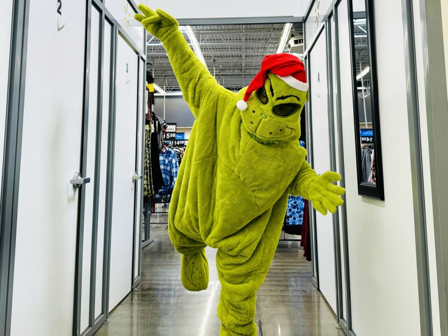 person wearing a green grinch costume