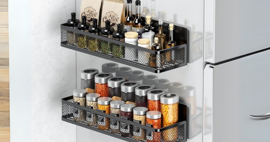 2 black metal magnetic spice racks on the side of a fridge