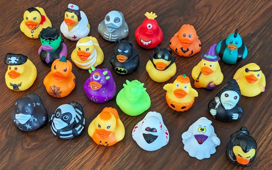 collection of halloween rubber ducks on a table