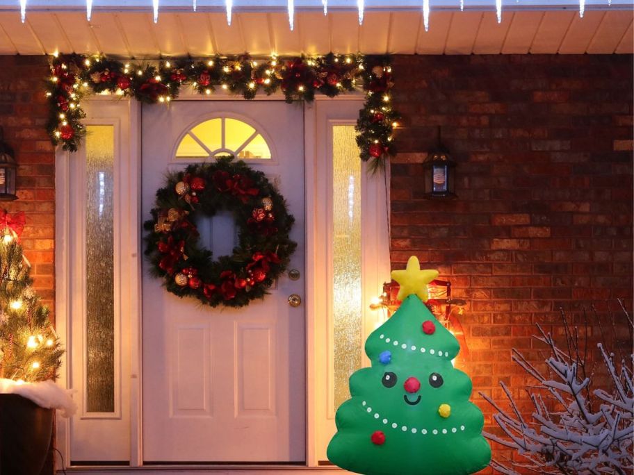 Holiday Living Inflatable Christmas Tree on a porch