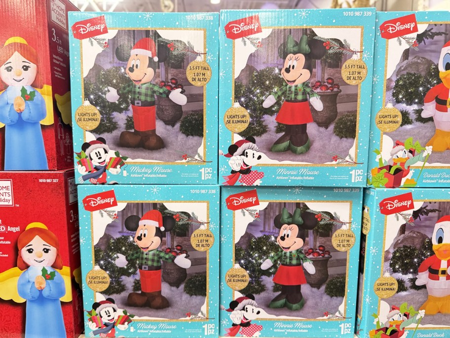 christmas minnie and mickey mouse inflatables on store shelf