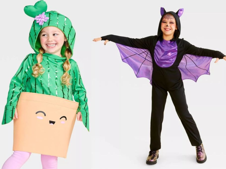 A child in a cactus costume and a bat costume