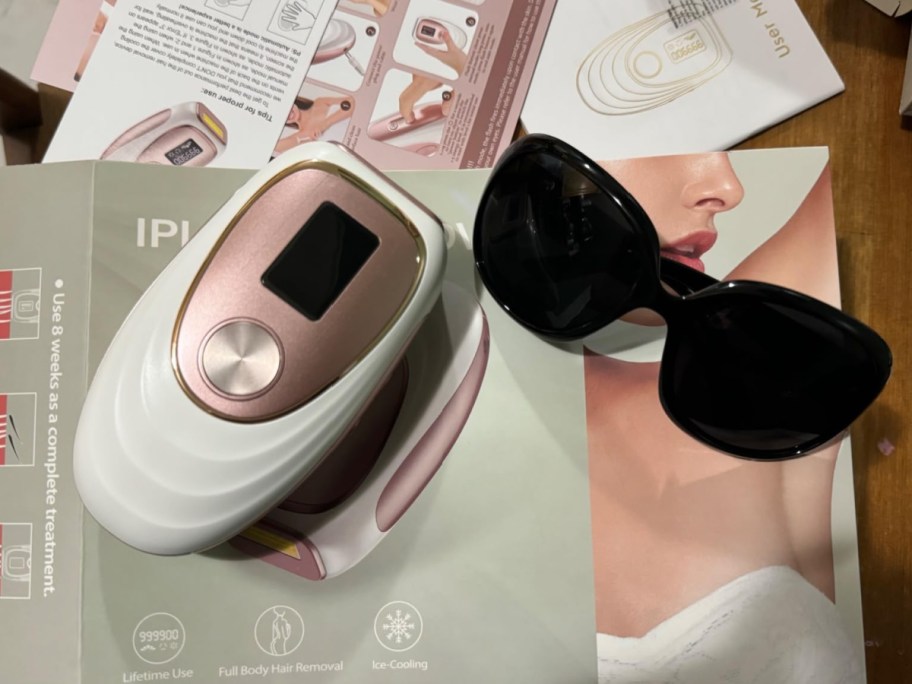 IPL-Laser-Hair-Remover-with-glasses-next-to-it.