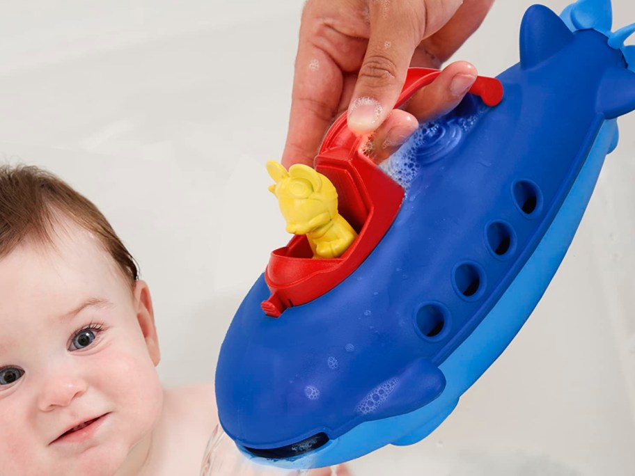 Kid-playing-with-Disney-submarine-in-the-bathtub.