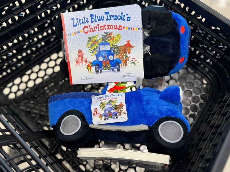 two Kohl's Cares Little Blue Truck's Christmas Plush Toy & Book Bundle in a Kohl's Shopping Cart