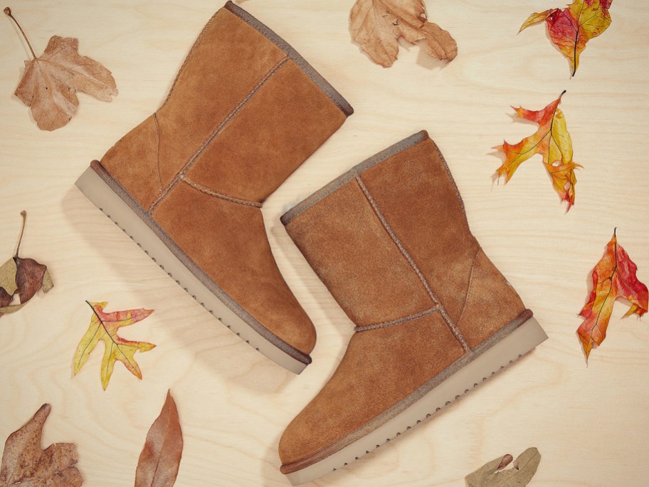 brown boots surrounded by leaves